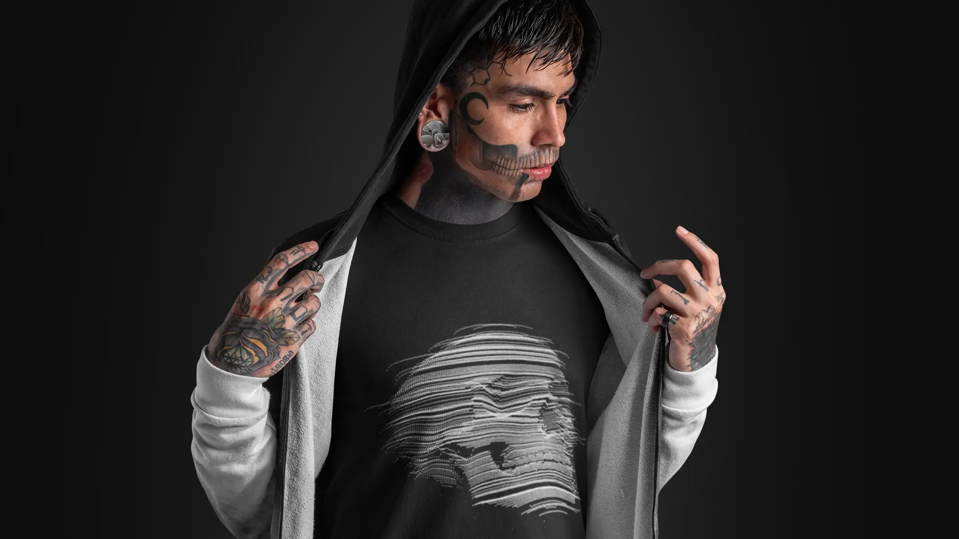 mockup-of-a-goth-man-with-tattoos-on-his-face-wearing-a-t-shirt-under-a-hoodie-26595